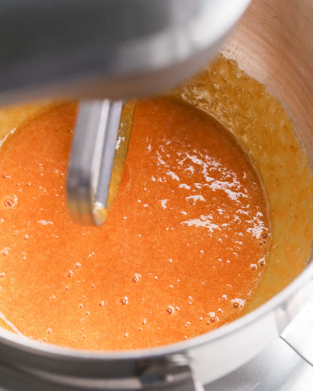 making pumpkin brownies - wet ingredients mixed together in a metal mixing bowl