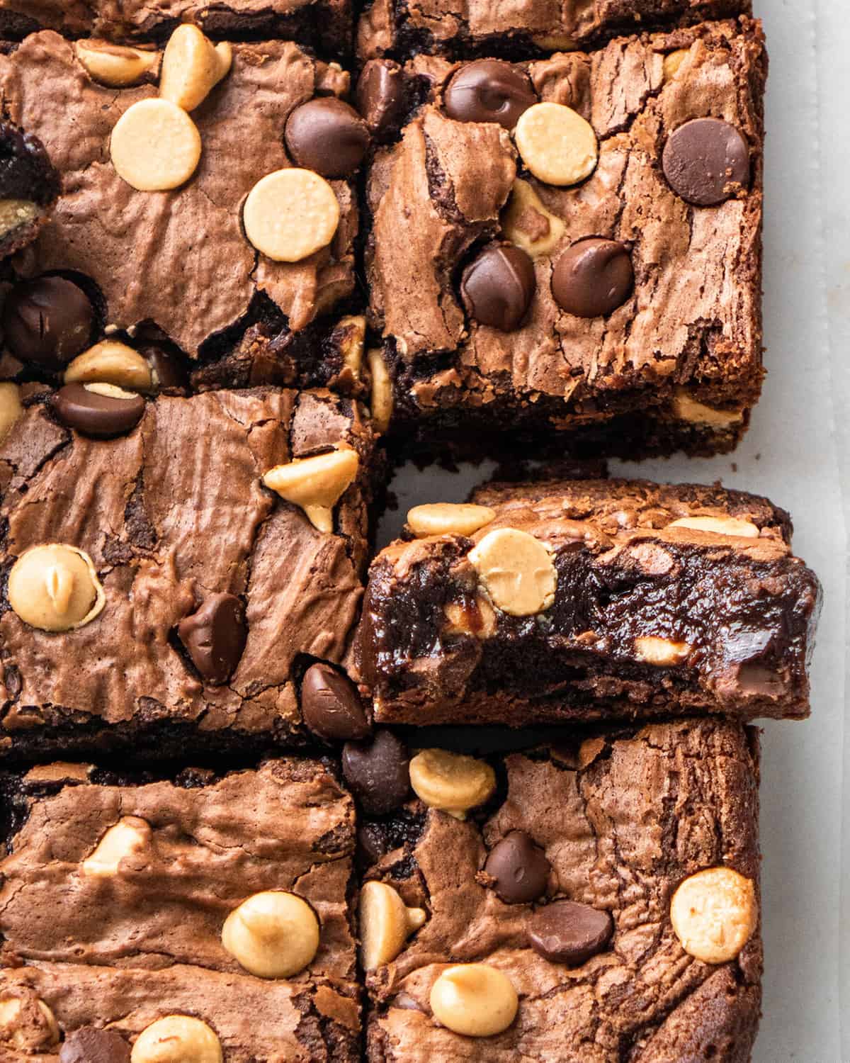 6 Chocolate Peanut Butter Brownies, one turned on it's side so we can see the inside 