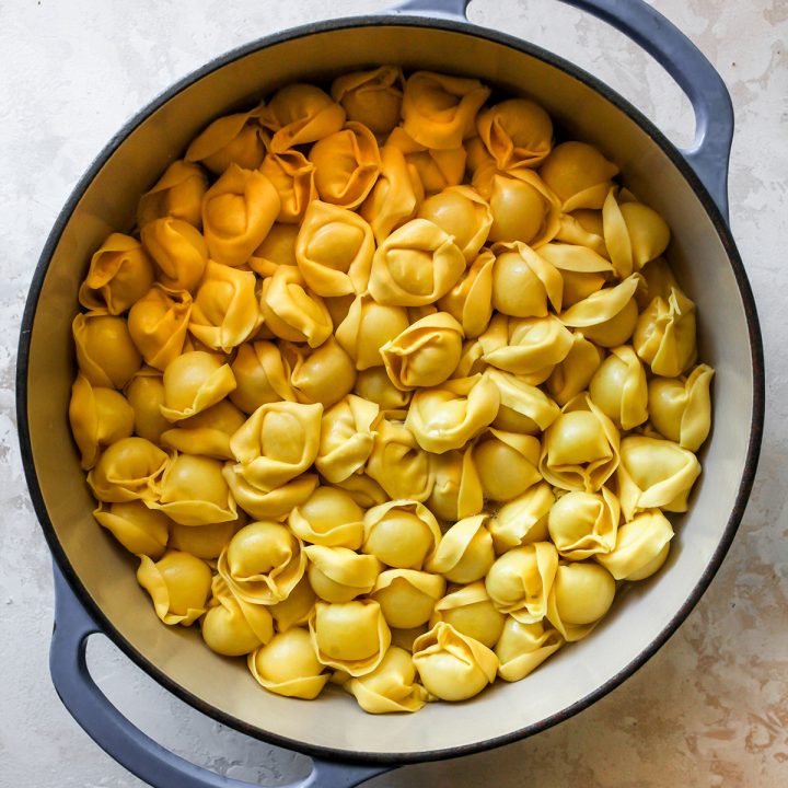 a pot of cooked tortellini to be used in this Spinach Tortellini recipe