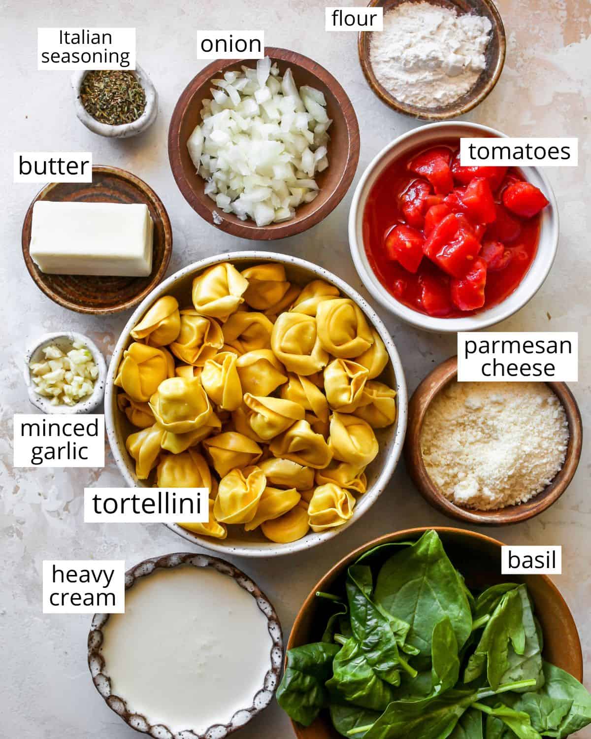 overhead photo of the labeled ingredients in this spinach tortellini recipe