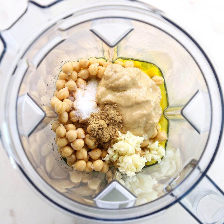 photo showing How to Make Hummus in a blender - adding the ingredients before being blended