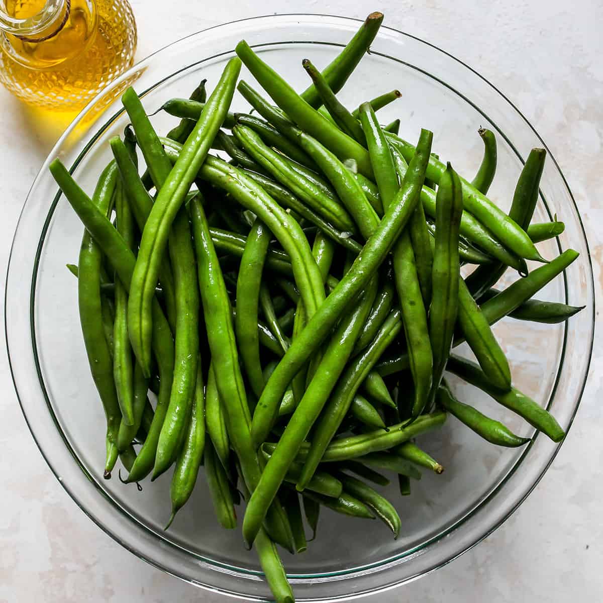 photo showing How to Roast Green Beans - washed trimmed green beans in a bowl