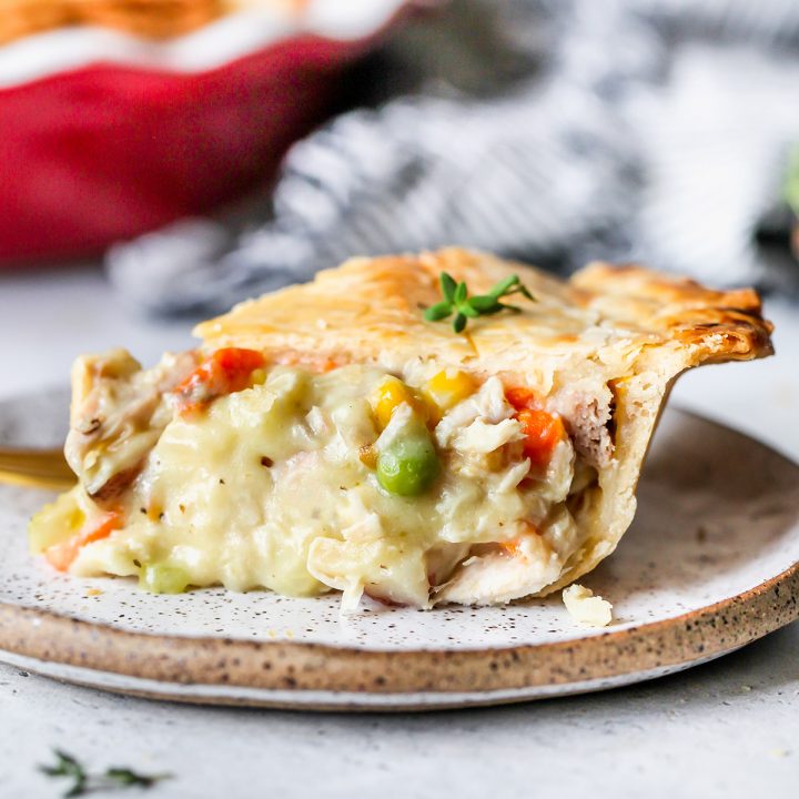 side view of a slice of Turkey Pot Pie on a plate 