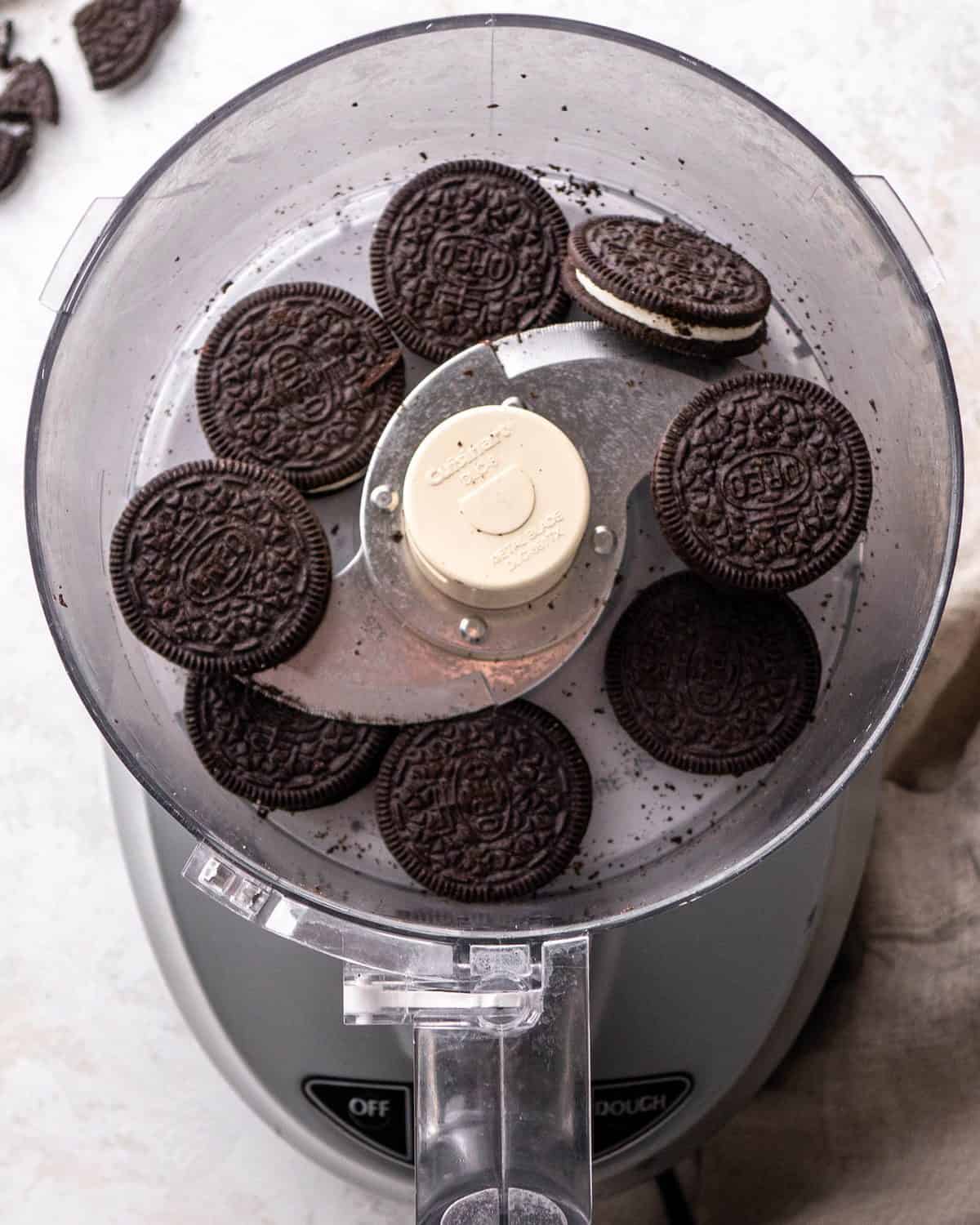 making Oreo pie recipe - 8 Oreos in a food processor fitted with the "S". blade