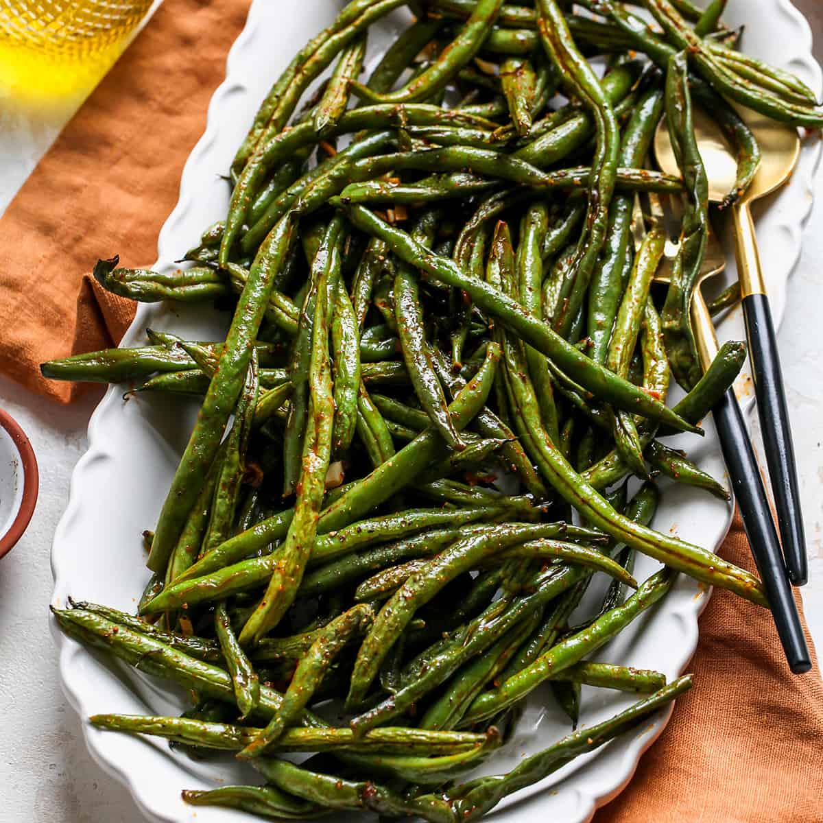 Roasted Green Beans on a white serving dish