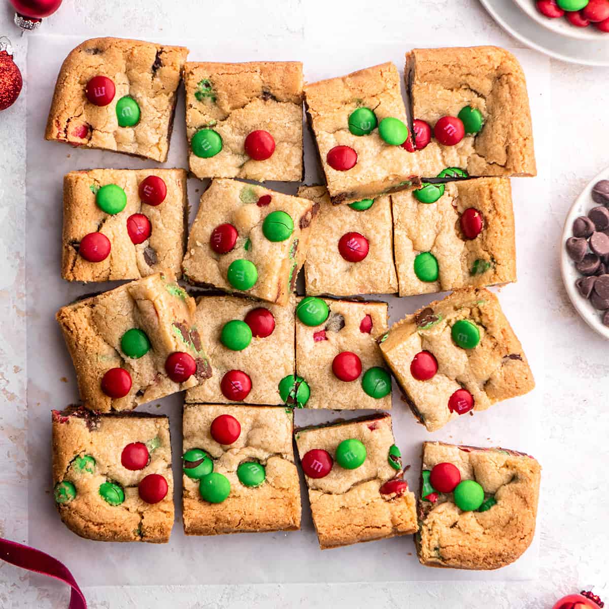 M &M Christmas cookie bars cut into 16 squares