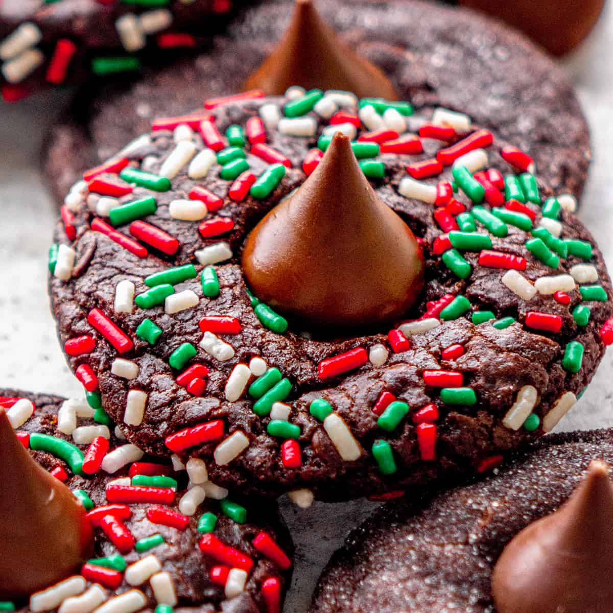 4 Chocolate Kiss Cookies rolled in  sprinkles and sugar