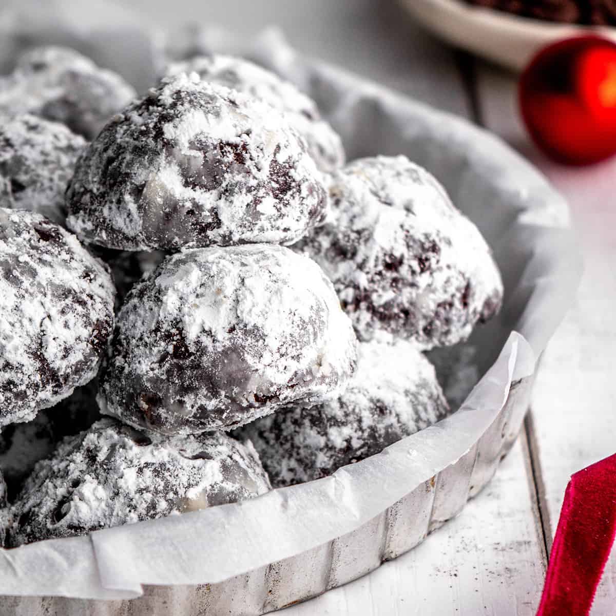 9 Chocolate Snowball Cookies on a serving dish