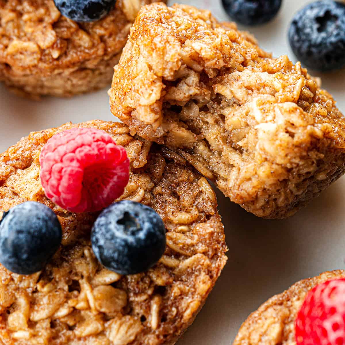 Baked Oatmeal Cups with berries and maple syrup