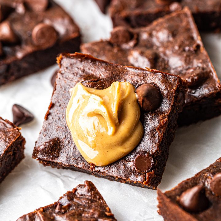 Healthy Chocolate Peanut Butter Brownies with peanut butter on top