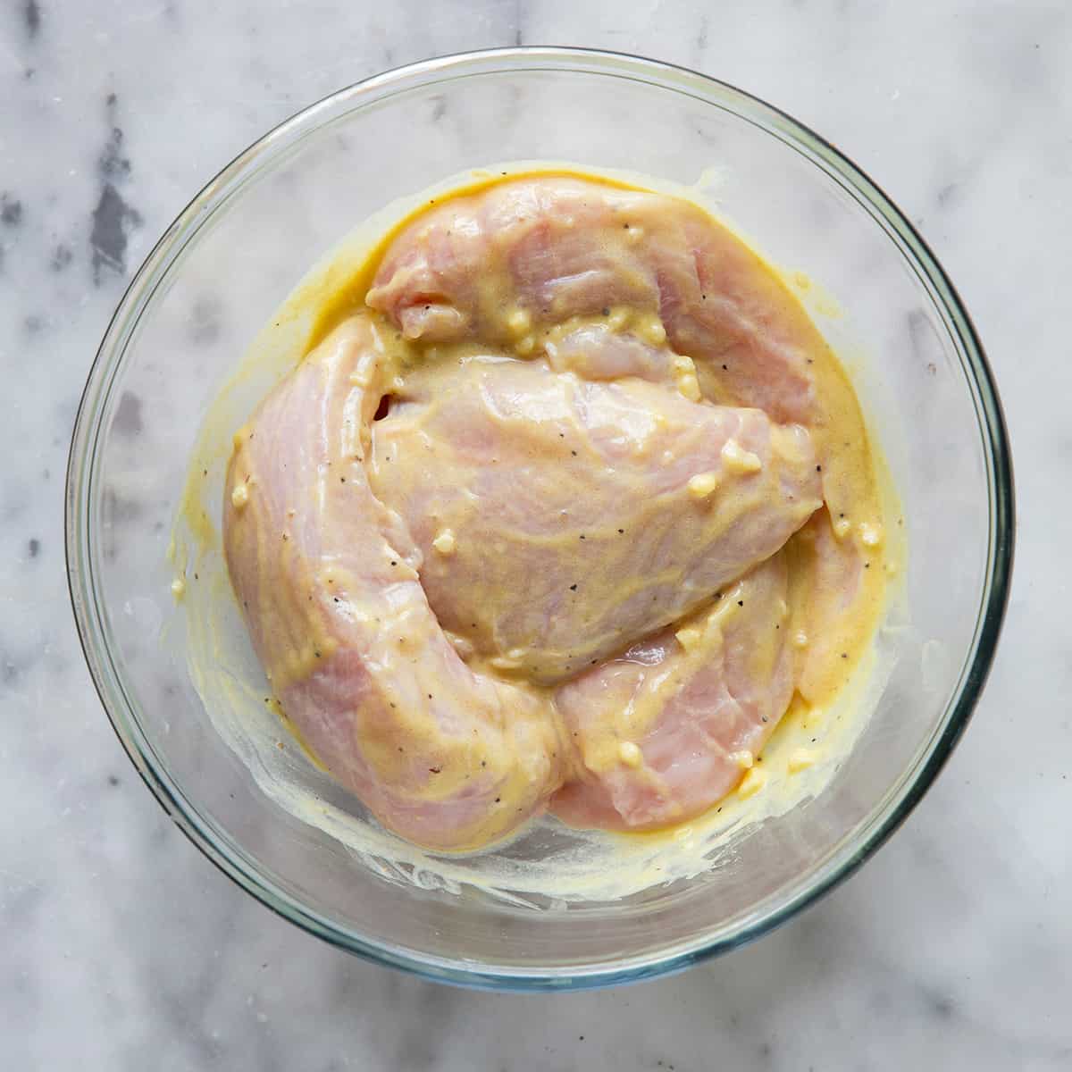 photo showing How to Make Honey Mustard Chicken - marinading the chicken breasts