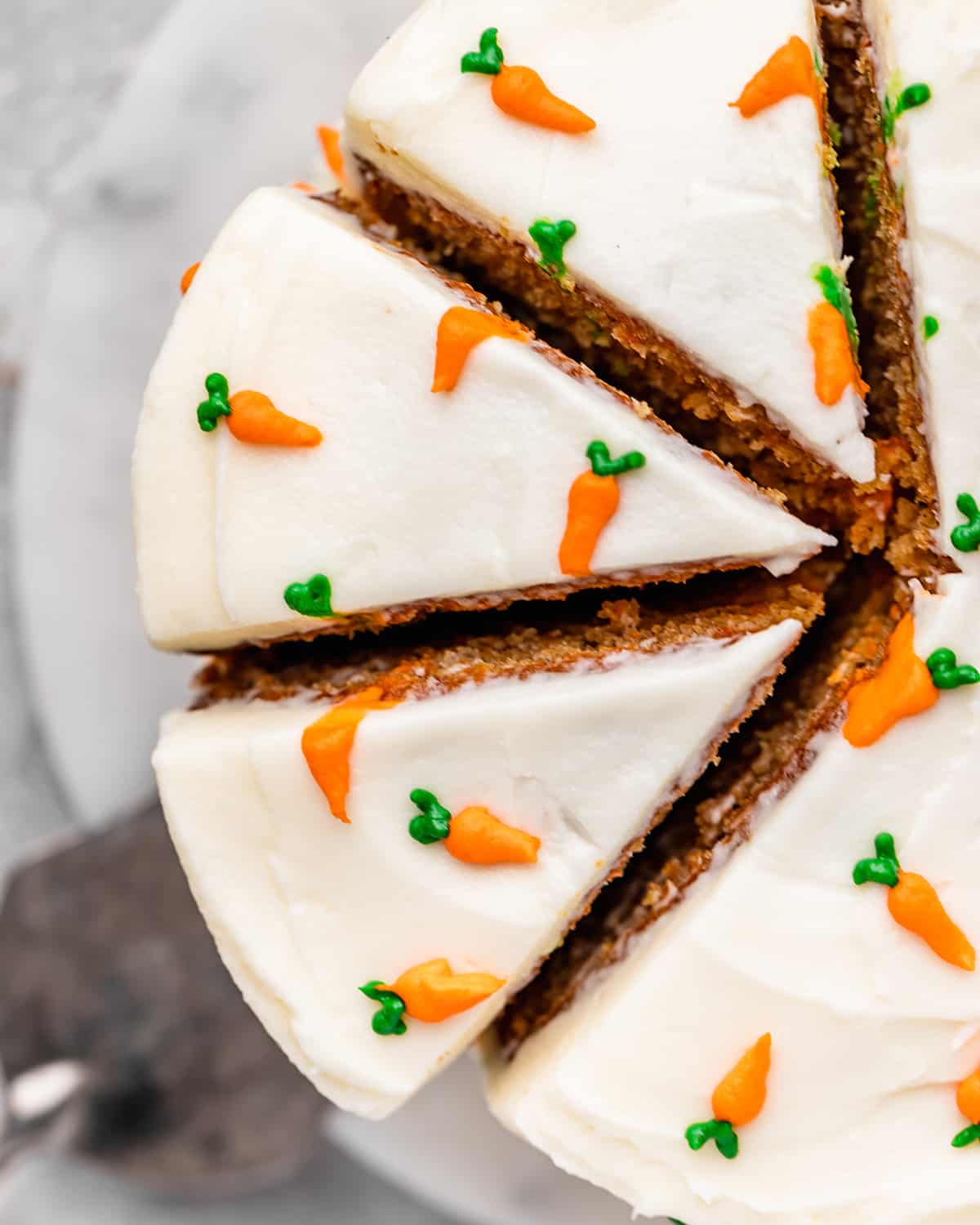 3 slices cut out of a carrot cake