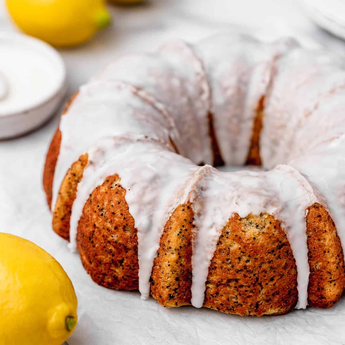 front view of a Lemon Poppy Seed Cake with glaze
