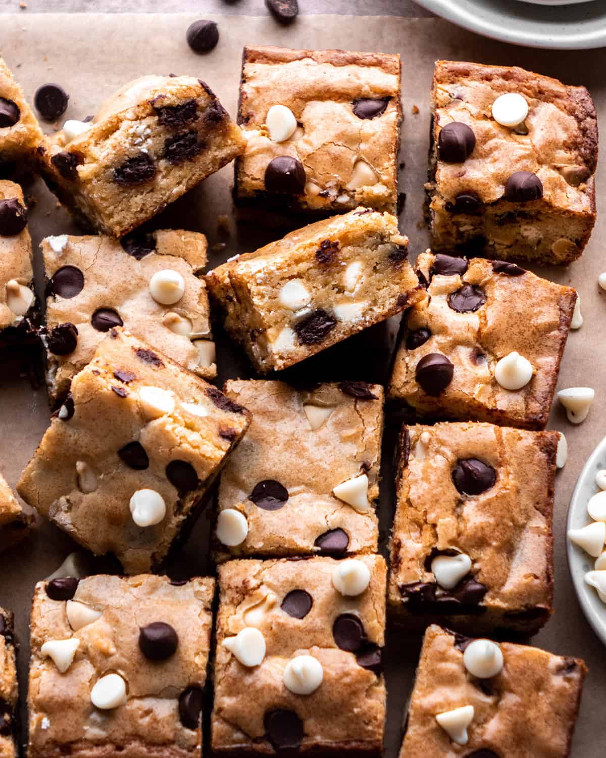 12 blondies cut into square with chocolate chips and white chocolate chips