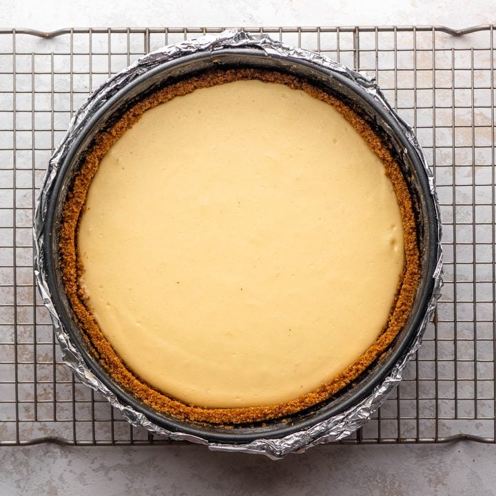 a baked cheesecake before being removed from the pan