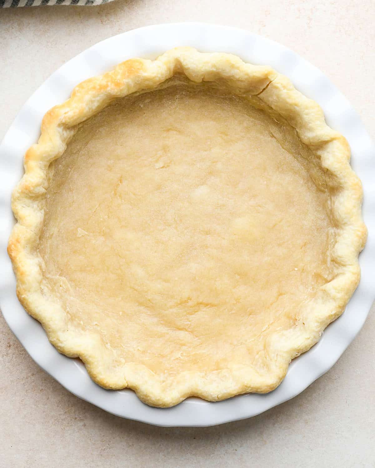 par-baked pie crust in a pie dish to make this quiche recipe