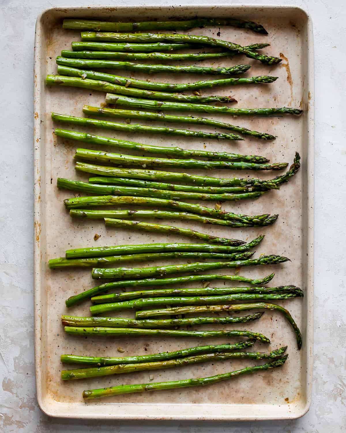 photo showing How to Roast Asparagus - asparagus on the baking sheet, roasted.