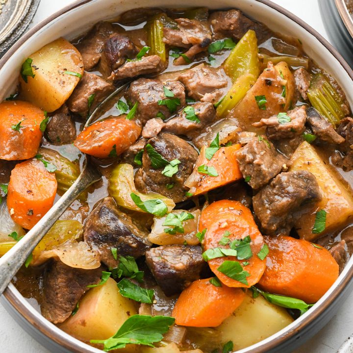 Slow Cooker Beef Stew in a bowl with a spoon