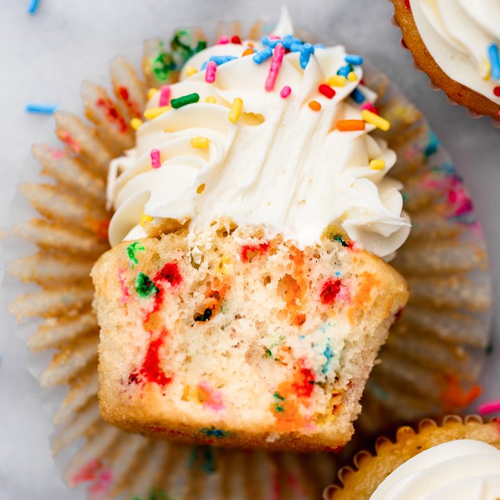 a Funfetti Cupcake with a bite taken out of it