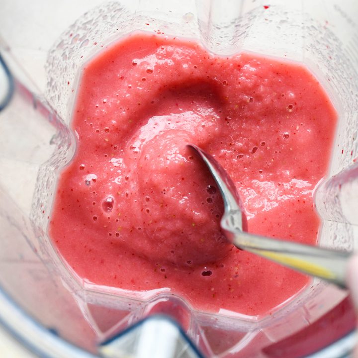 How to Make a Watermelon Smoothie - spoon scooping smoothie out of the blending container