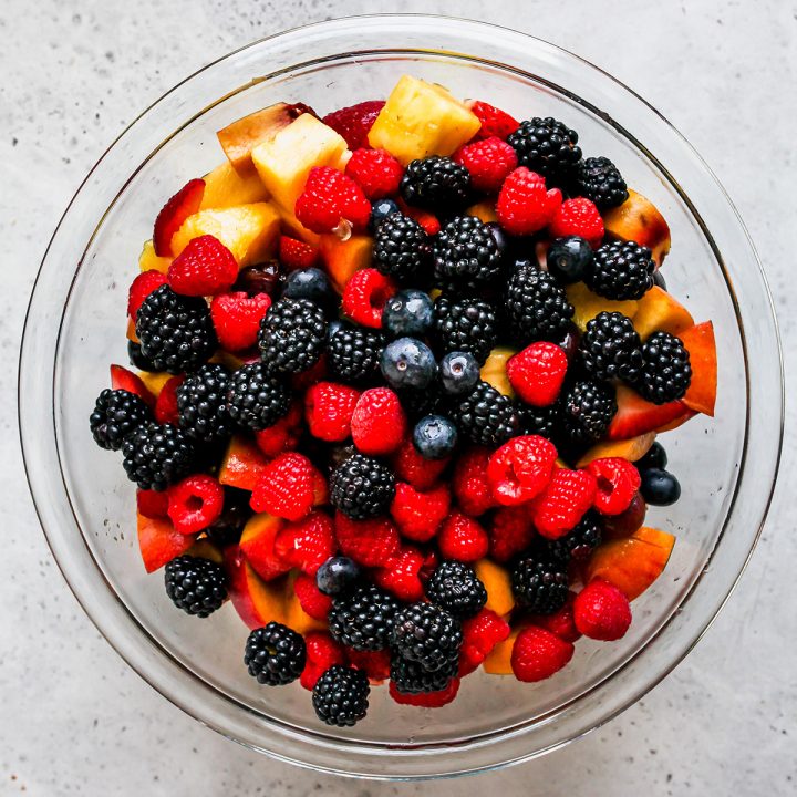 How to Make Fruit Salad - adding berries to the salad. 