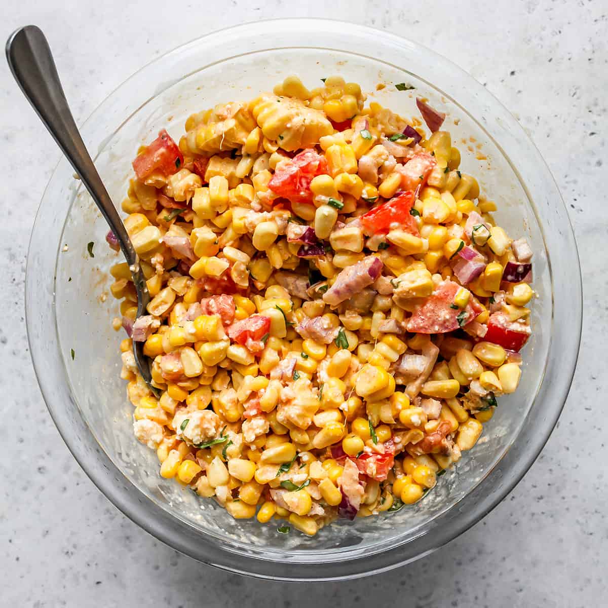 Mexican Corn Salad in a mixing bowl. 