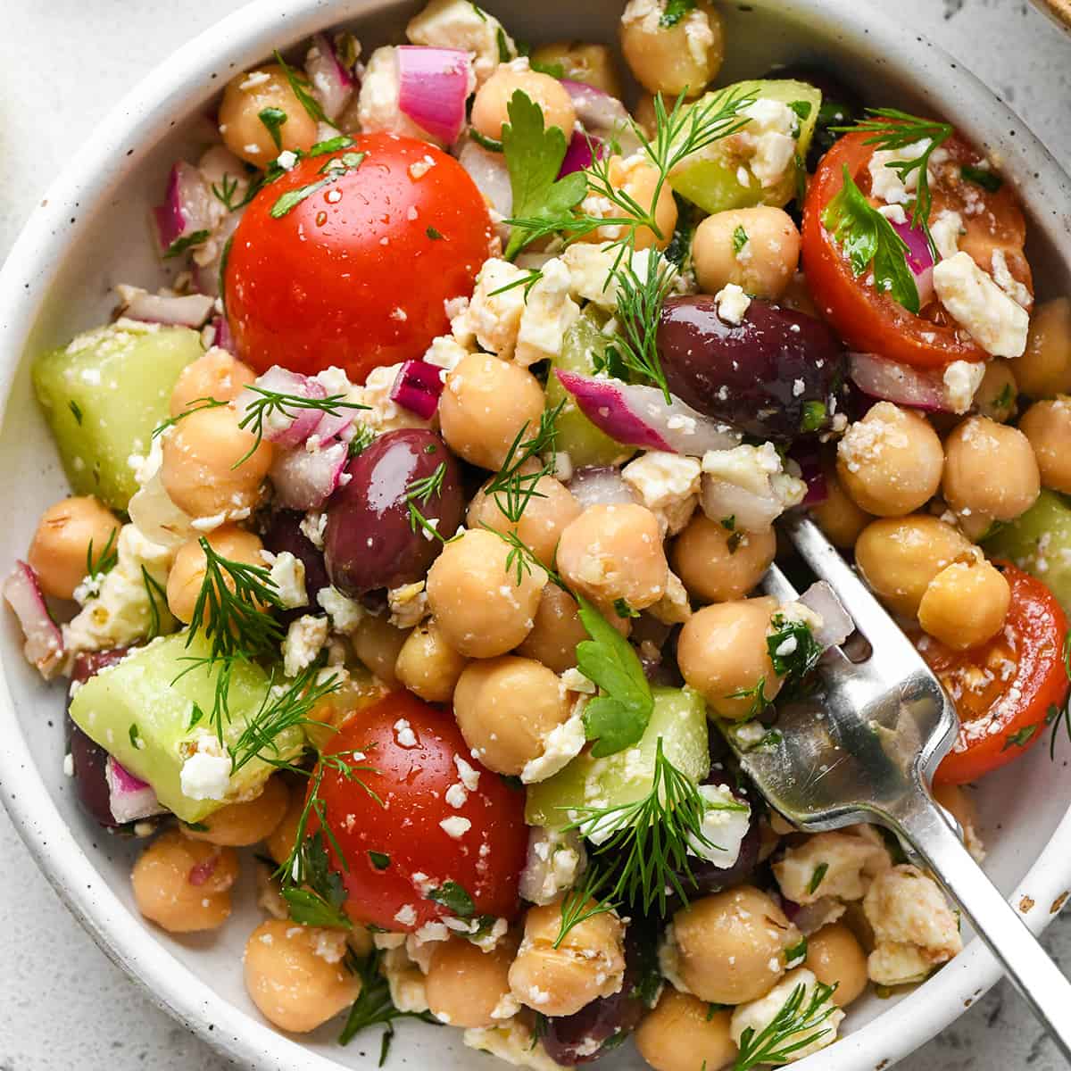 Mediterranean Chickpea Salad on a plate with a fork