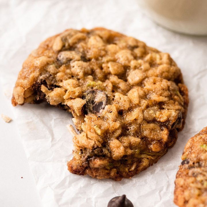 an oatmeal Zucchini Cookie with a bite taken out of it