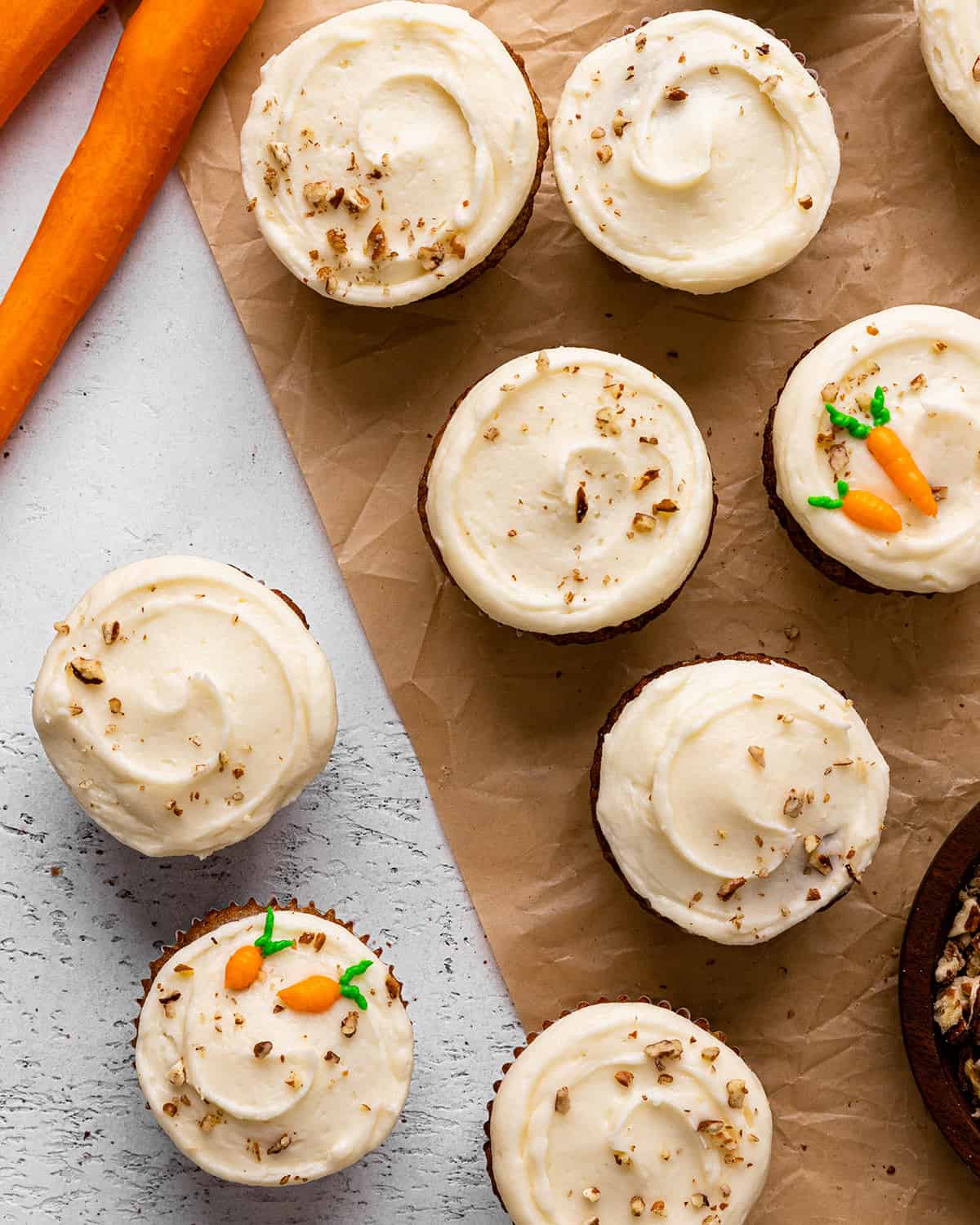 overhead view of 8 Carrot Cake Cupcakes with cream cheese frosting