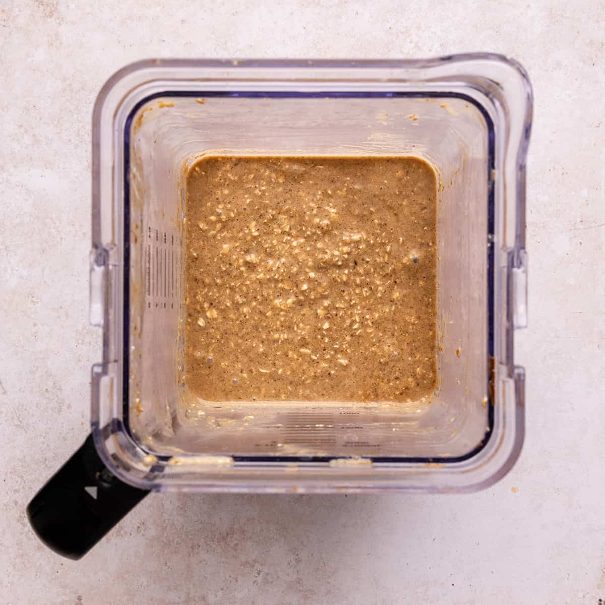 banana oatmeal muffin batter in the blending container after blending. 