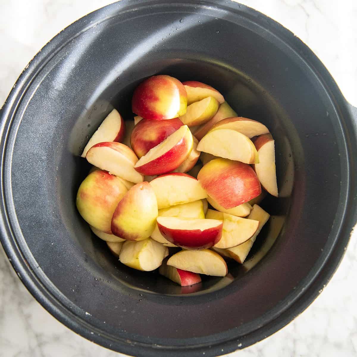 How to Make Applesauce - apples in a crockpot before cooking