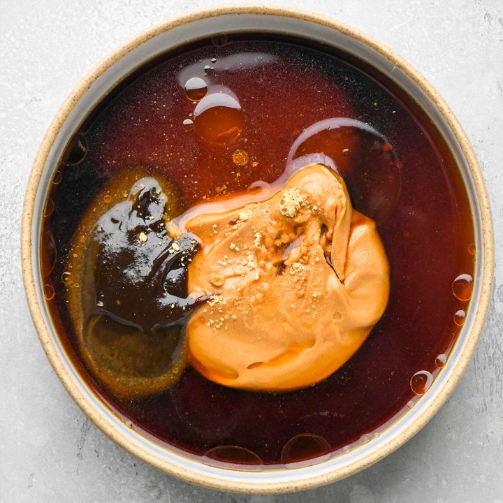 how to make peanut sauce - ingredients in a bowl before whisking