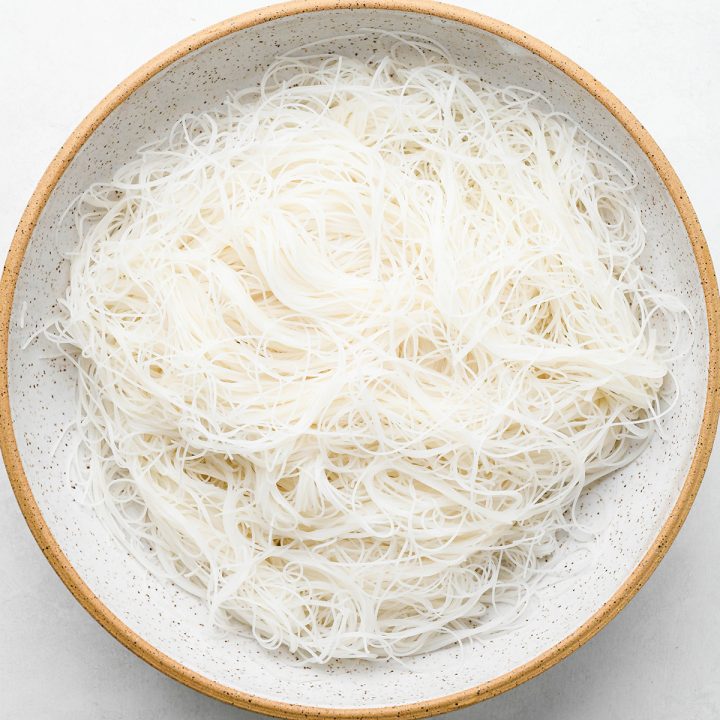 a bowl of brown rice noodles cooked 