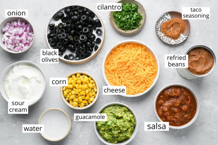 overhead photo of the ingredients in this Mexican 7 Layer Dip recipe
