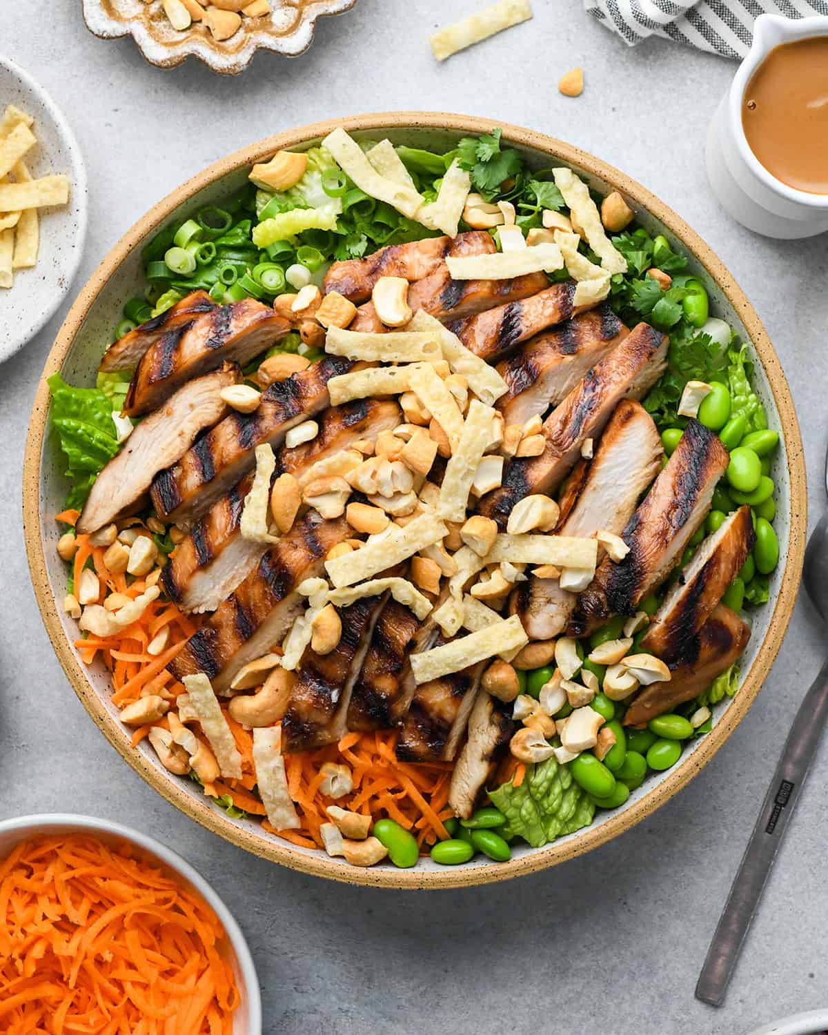 assembling Asian Chicken Salad in a large bowl
