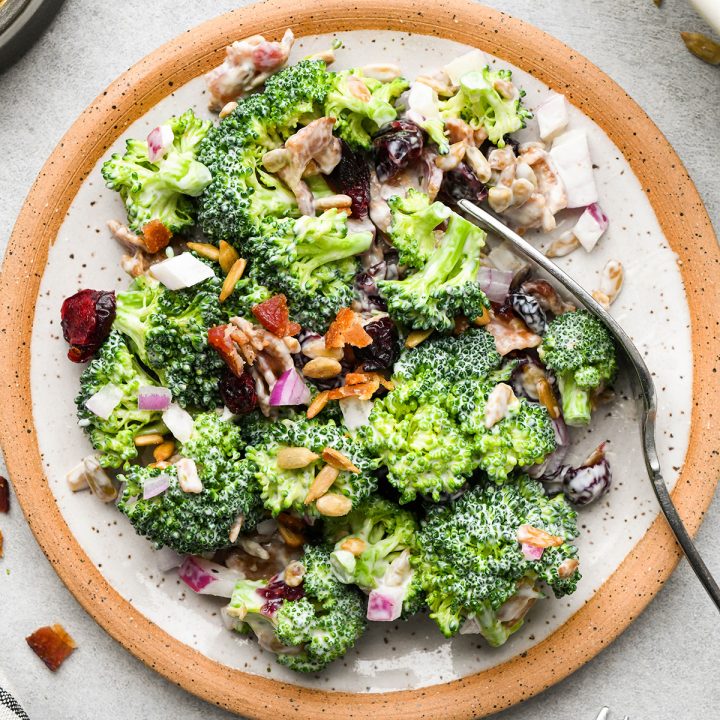 a plate of Broccoli Salad with a fork