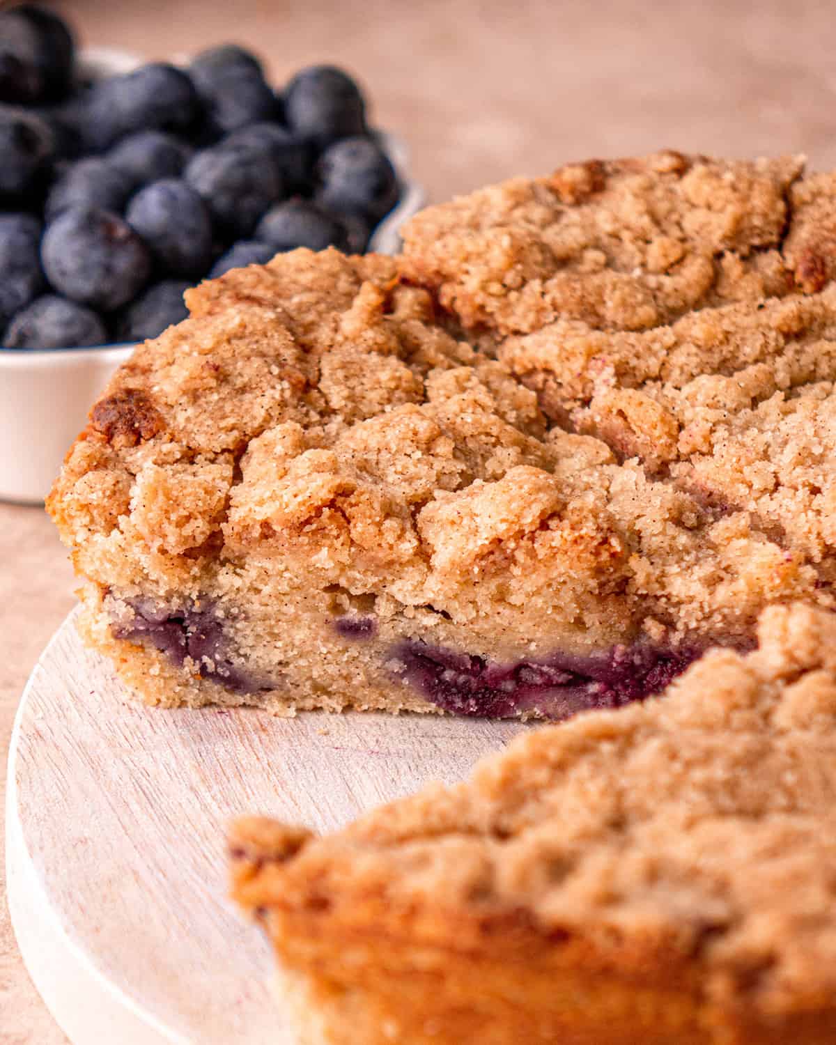 Blueberry Coffee Cake Recipe with a slice cut out of it