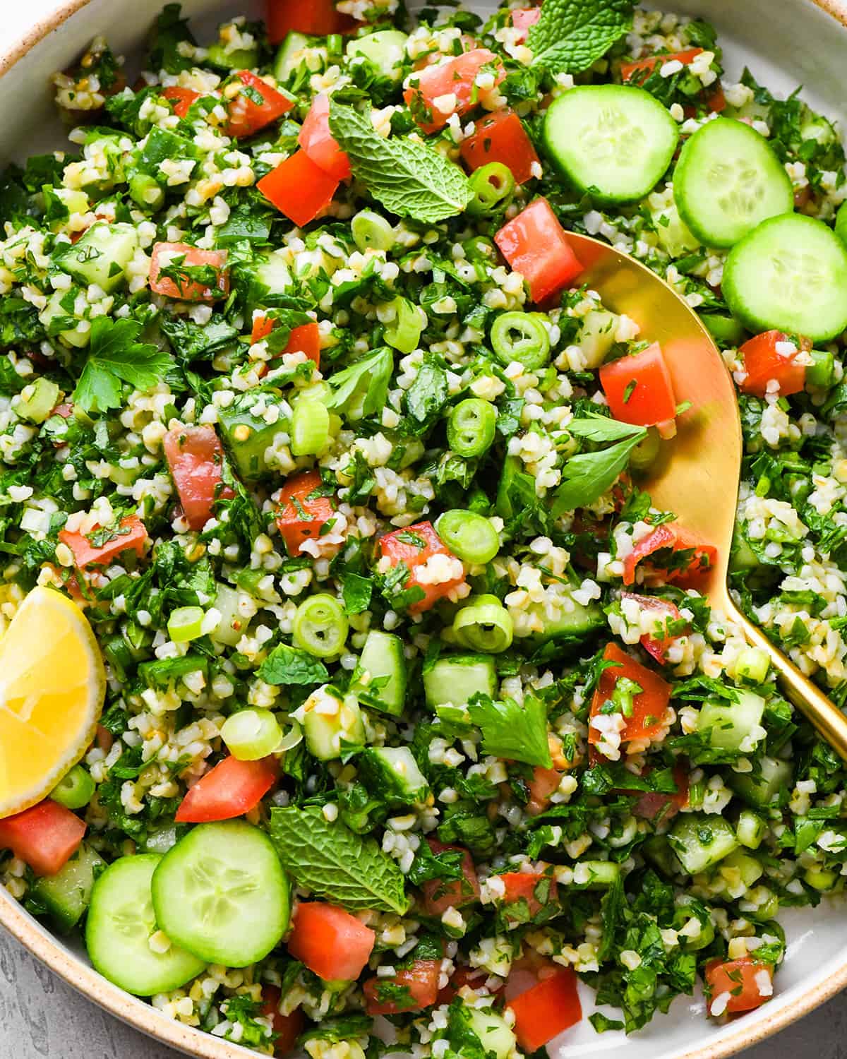 Tabbouleh Recipe in a serving bowl with a serving spoon