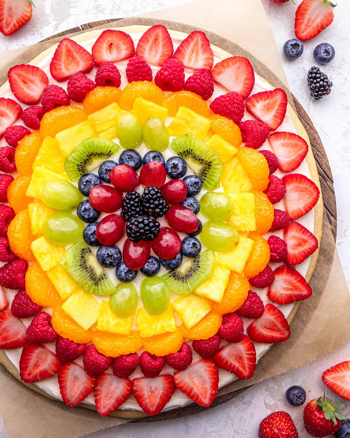 fruit pizza on a serving plate