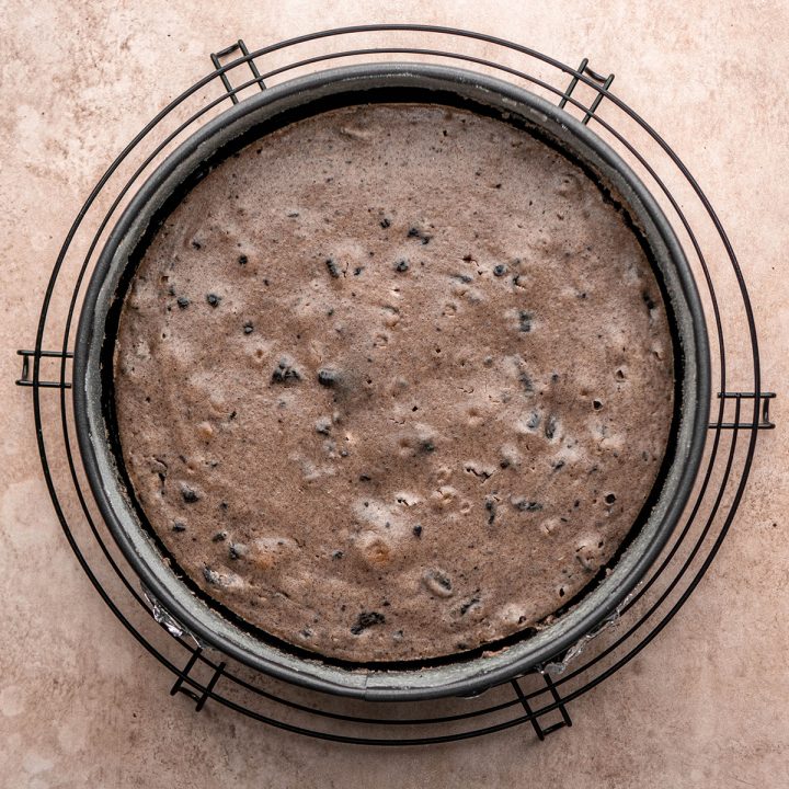 baked Oreo cheesecake on a wire cooling rack