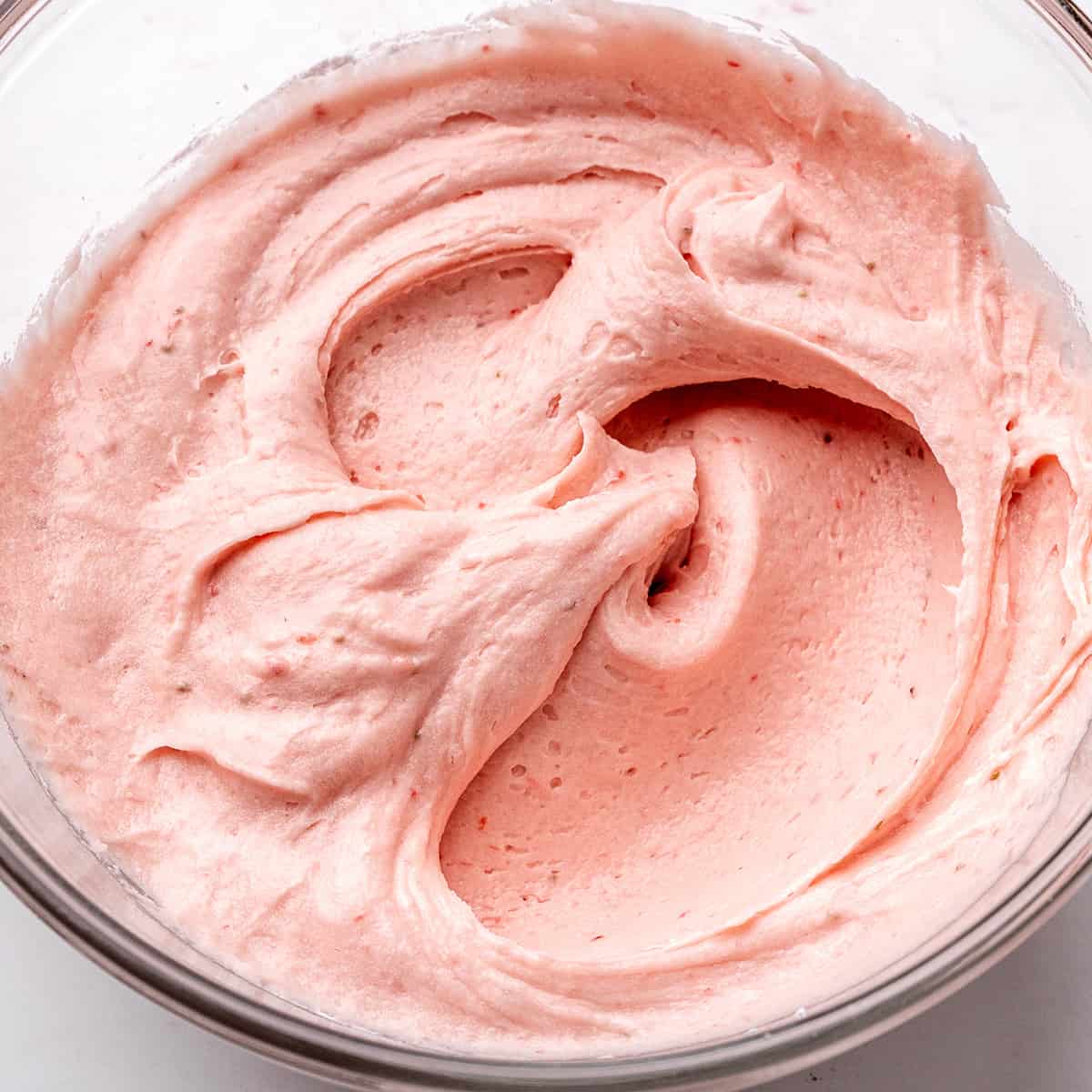 strawberry frosting in a bowl