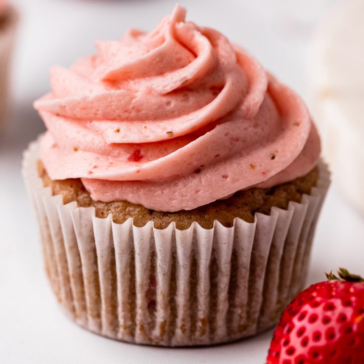 Strawberry Buttercream Frosting on top of a cupcake