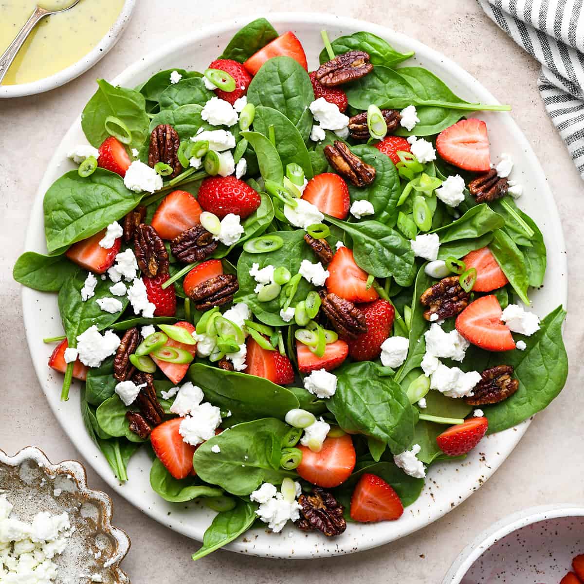 Strawberry Spinach Salad assembled on a plate