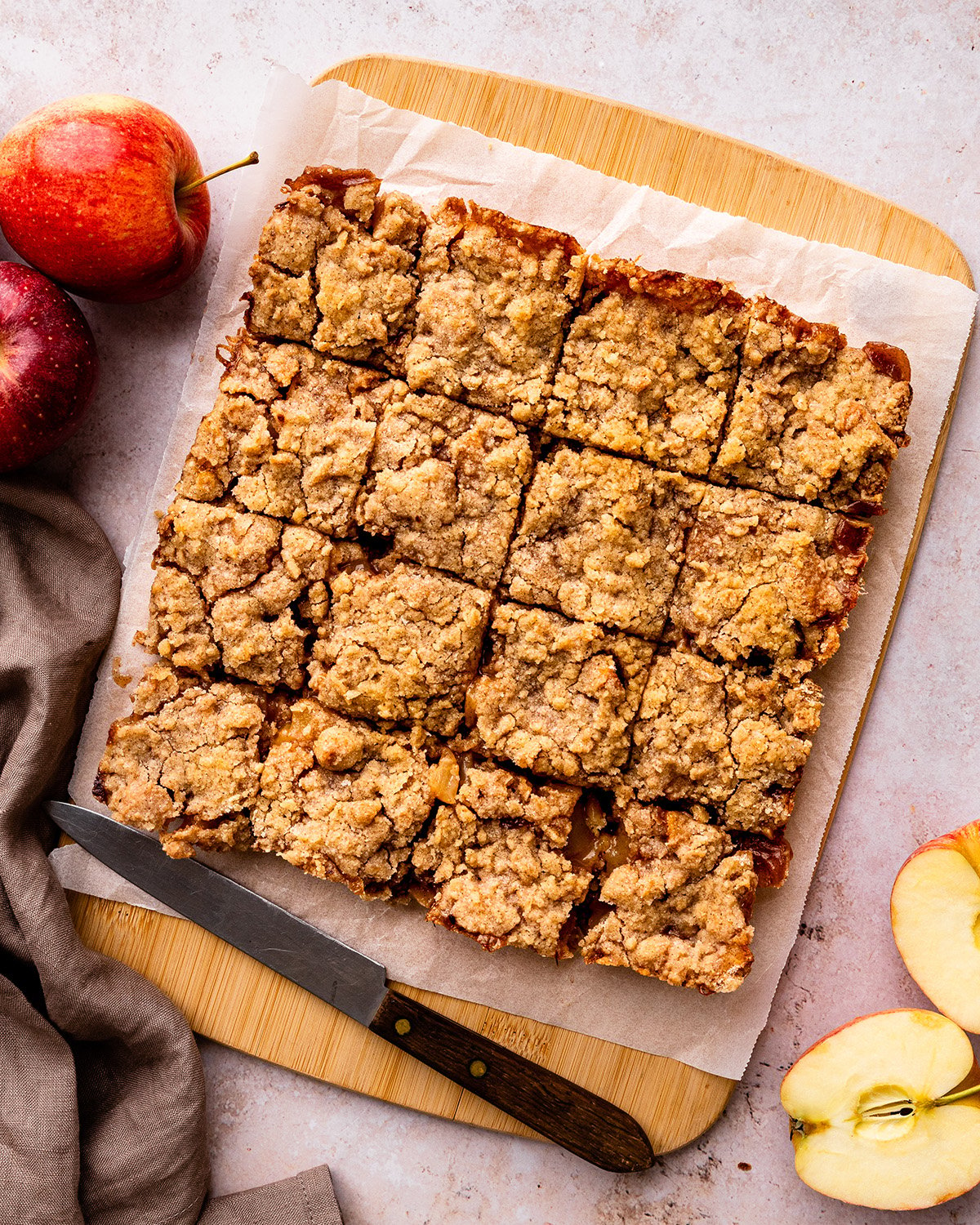 Apple Pie Bars cut into squares on a cutting board
