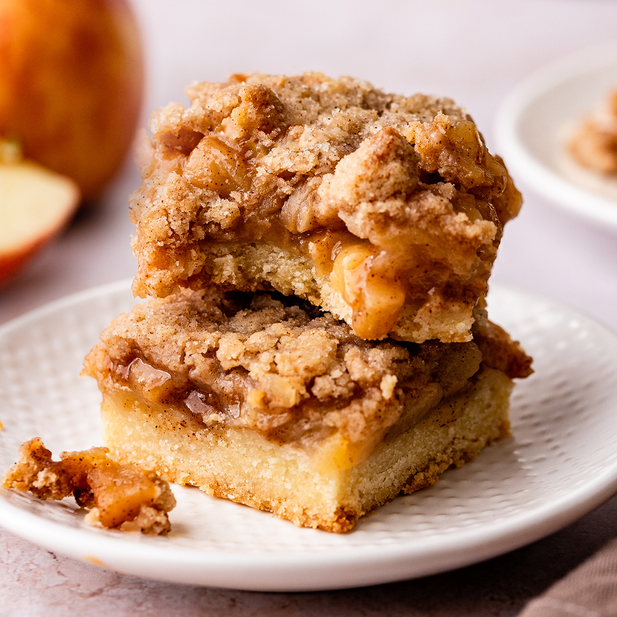 a stack of 2 Apple Pie Bars on a plate