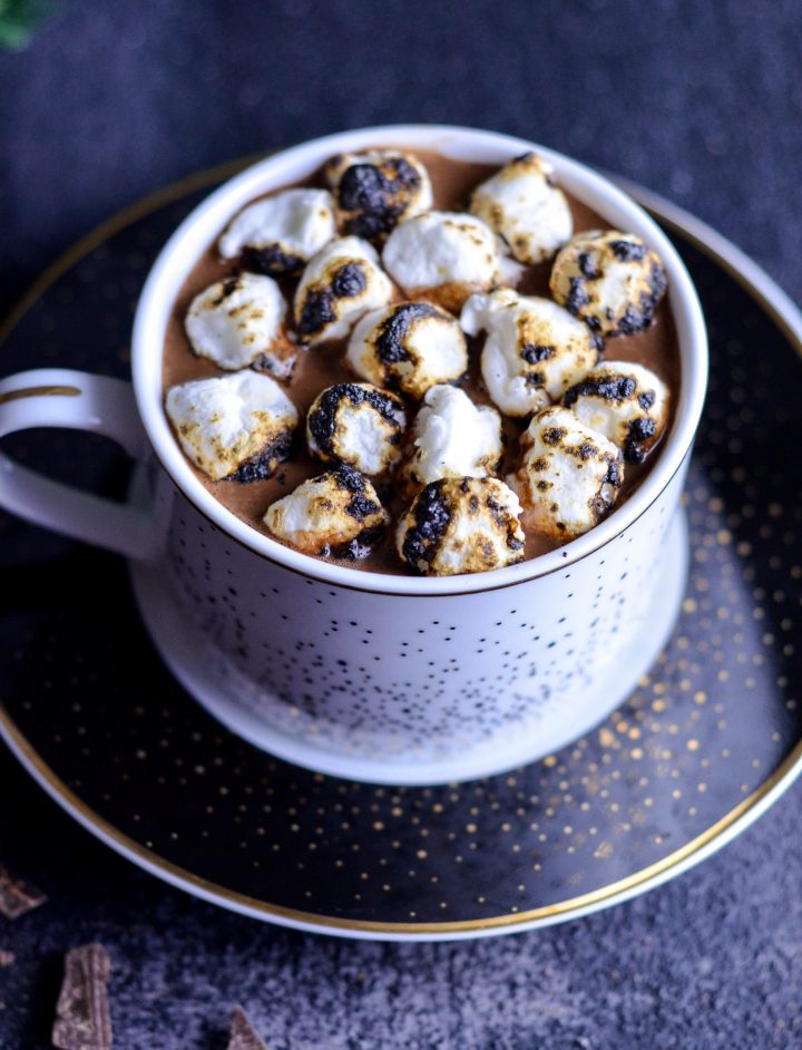 a mug of dairy free hot chocolate with toasted marshmallows