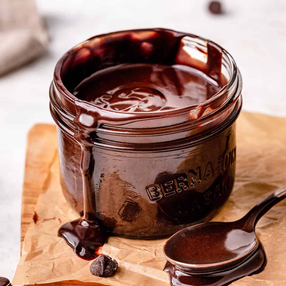 a glass jar of homemade chocolate sauce