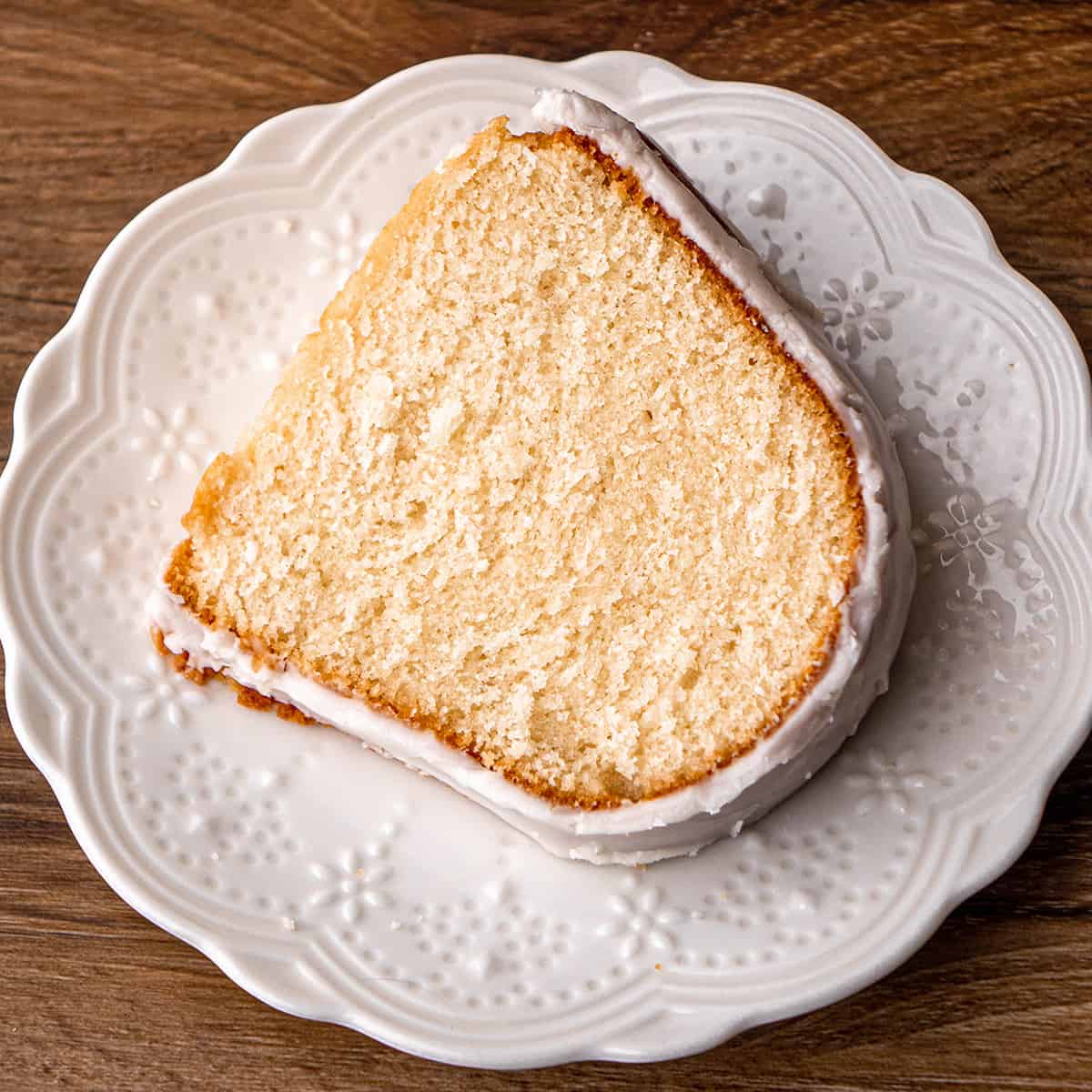 a slice of Vanilla Bundt Cake on a plate