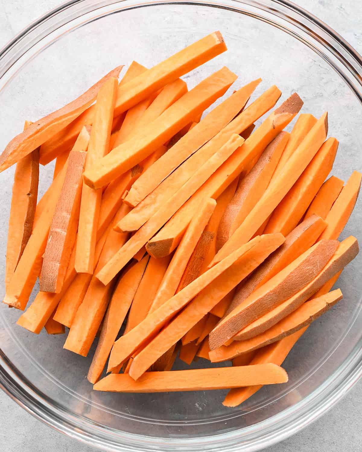 sweet potatoes cut into matchsticks to make sweet potato fries