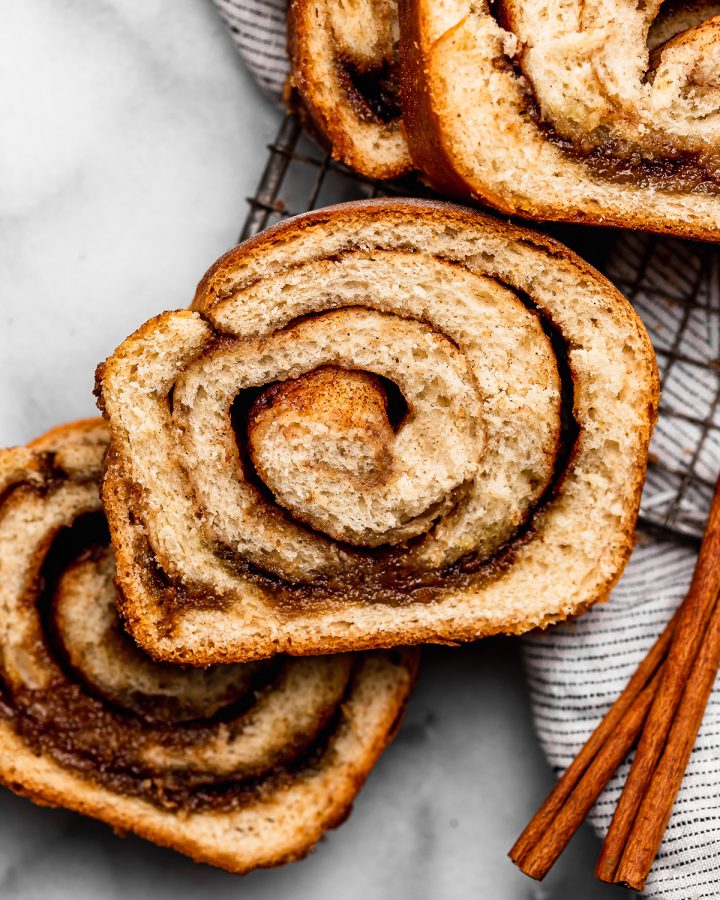 4 slices of Cinnamon Swirl Bread on a cooling rack